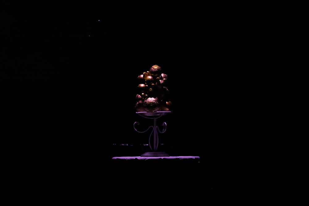 A tower of golden titties.
