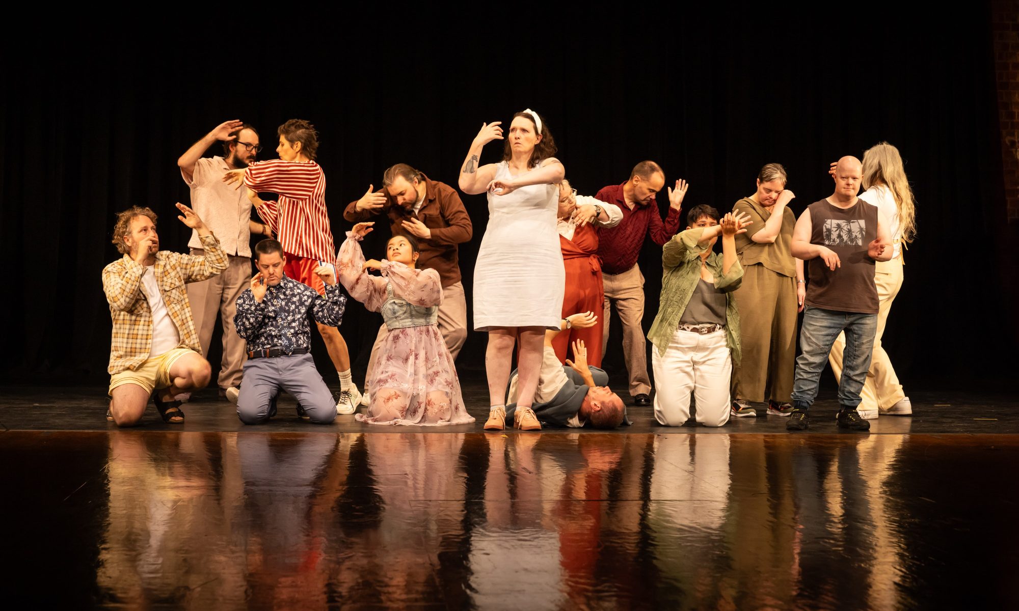A group of individuals dance.
