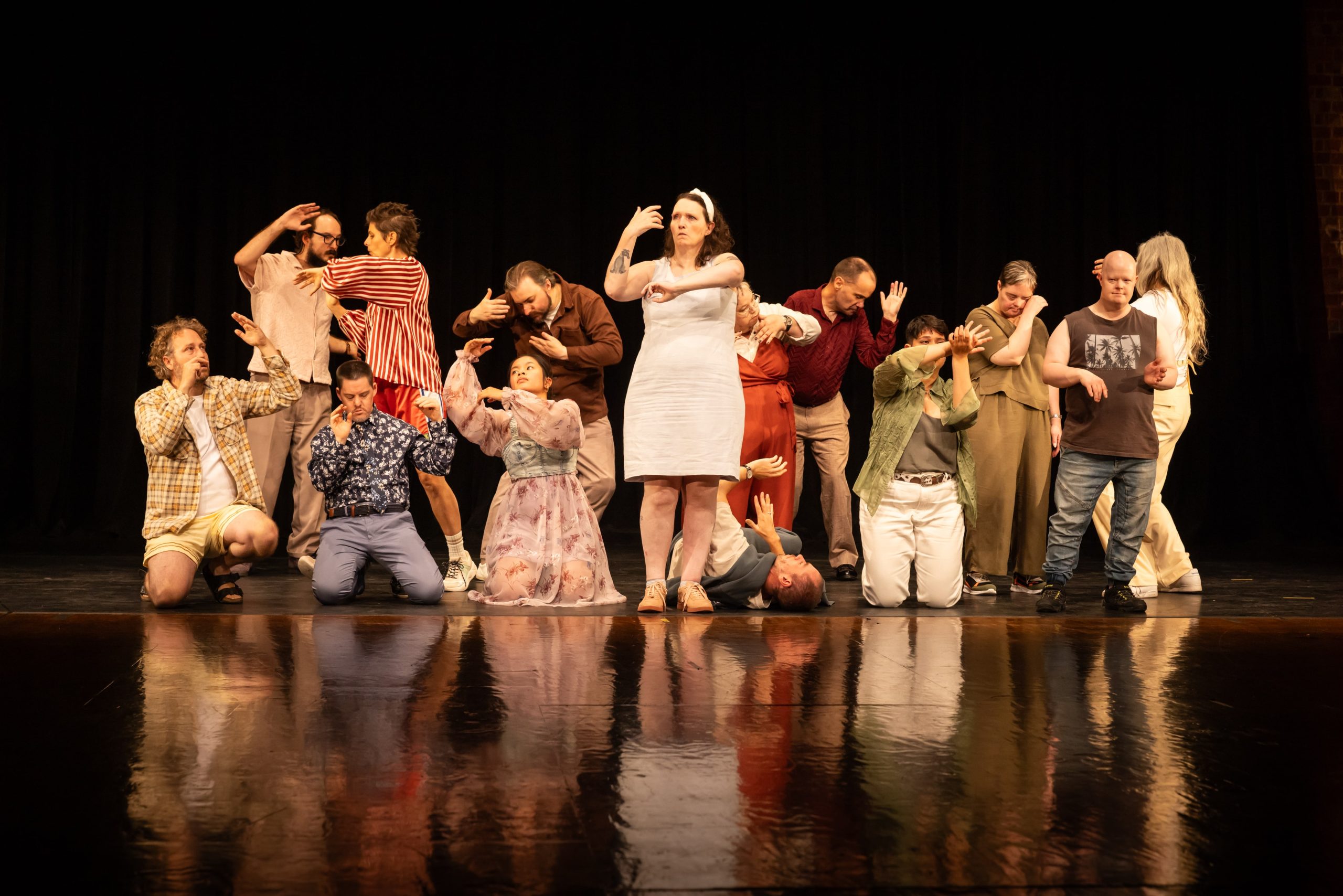A group of individuals dance.